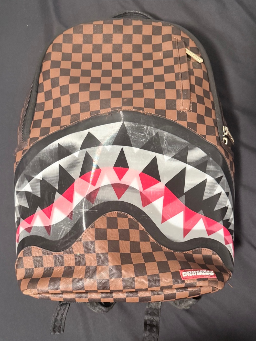 Limited Edition Sprayground Brown Checkered Backpack 

Gently used